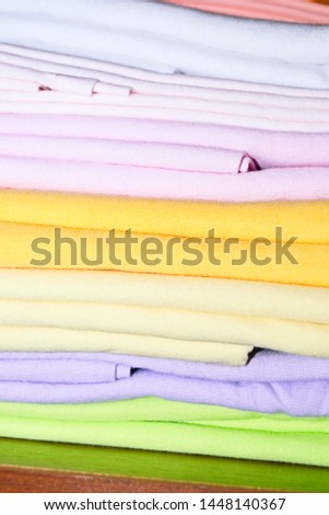 Different colored sheeets in a pile