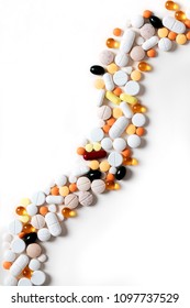 Different Colorful Pills On The White Background. Copy Space