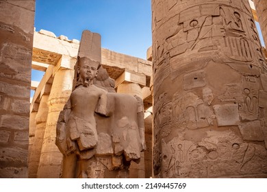 Different columns with hieroglyphs in Karnak temple. Karnak temple is the largest complex in ancient Egypt. - Shutterstock ID 2149445769