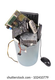 Different Computer Parts And Phone In Trash Can