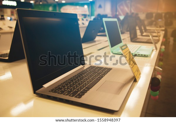 different computers in\
store background