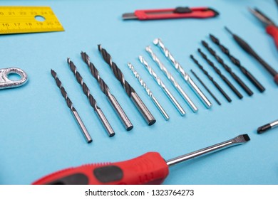 Different construction kit are hanging on background