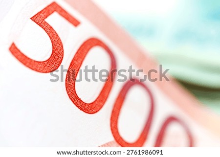 Different currency notes are shown, highlighting cash transactions and the presence of cash in Russia. This reflects the monetary exchanges taking place in everyday life.