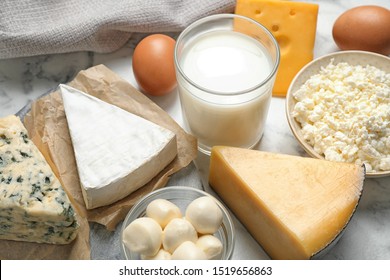 Different delicious dairy products on table, closeup