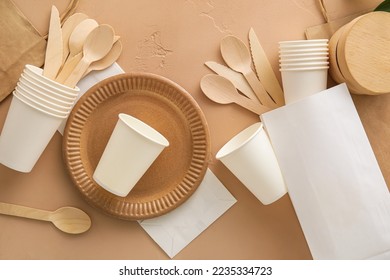 Different Eco tableware on beige background