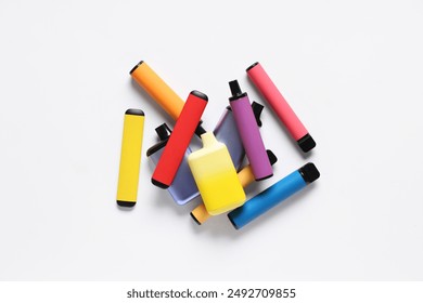 Different electronic cigarettes on white background
