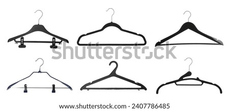 Different empty hangers isolated on white, set