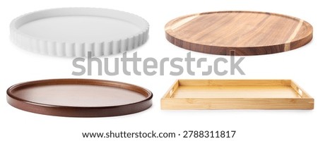 Different empty trays isolated on white, set