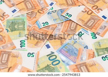 Different Euro Banknotes Money Background. Euro Money Currency. Colored Paper Money. A Lot of Fifty Euro Bills. Business, Finances, Cash and Money Saving Concept