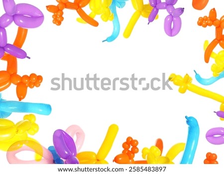 Different figures made of modelling balloons on white background