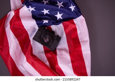 Different flags are on the table.