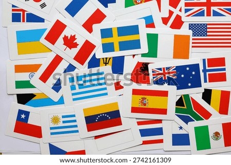 Different flags of the world. Mixed in a large pile. Concept photo.