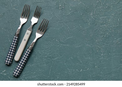 Different Forks On Grey Background, Top View