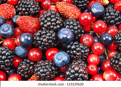 different fresh berries as background