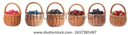 Different fresh berries in wicker baskets isolated on white, set