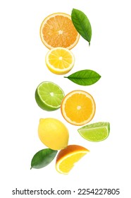 Different fresh citrus fruits and leaves falling on white background - Shutterstock ID 2254227805