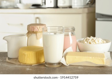 Different Fresh Dairy Products On Gray Table