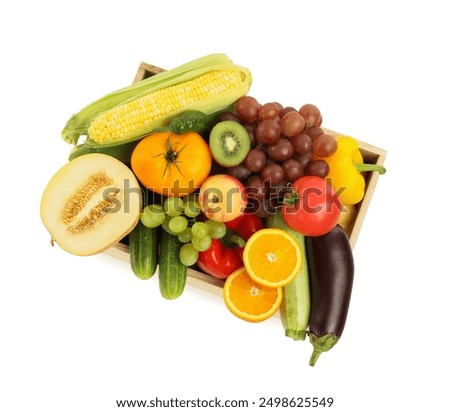 Different fresh fruits and vegetables in crate isolated on white, top view