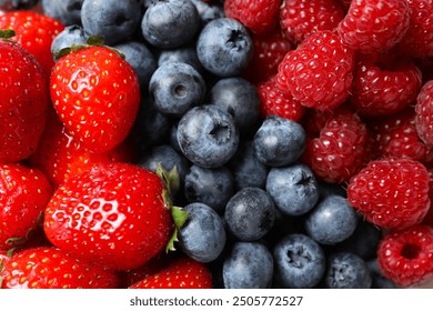 Different fresh ripe berries close up, top view - Powered by Shutterstock