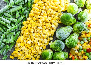 Different Frozen Vegetables As Background, Top View. Stocking Up Vegetables For Winter Storage. Assortment Of Frozen Vegetables. Healthy Food, Cooking Ingredients