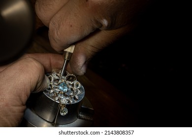 Different goldsmiths tools on the jewelry workplace. Jeweler at work in jewelry. Desktop for craft jewelry making with professional tools. Close up view of tools. - Shutterstock ID 2143808357