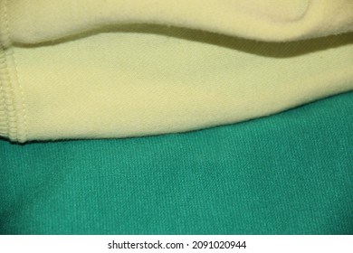 Different Green Fabric. Folds On The Fabric. Backgrounds