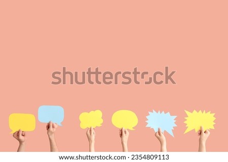 Different hands with speech bubbles on red background