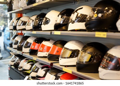 Different Helmets For Sale In Modern Salon Of Motorcycle Riding Gear