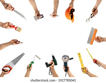 A lot of different instruments in the man's hands isolated on the white background