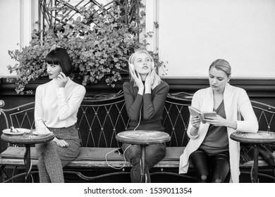 Different interests. Group pretty women cafe terrace entertain themselves with reading speaking and listening. Information source. Female leisure. Weekend relax and leisure. Hobby and leisure. - Shutterstock ID 1539011354