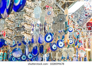 Different Jewish Souvenirs As Hamsa With Shalom (Peace) And Other Sale At The Popular Marketplace In Tel Aviv, Israel. Selective Focus