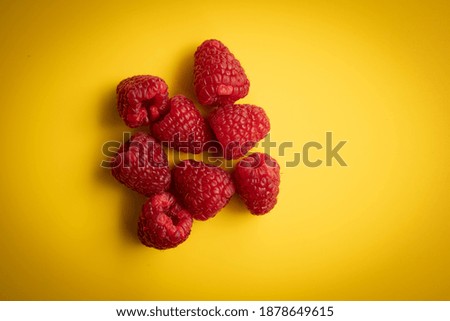 Similar – Frische Himbeeren auf gelbem Hintergrund