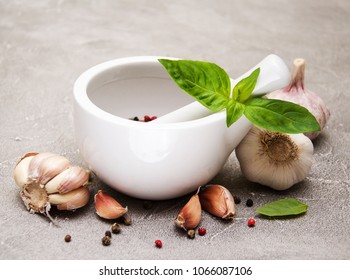 Different kind of spices on a  stone background - Shutterstock ID 1066087106
