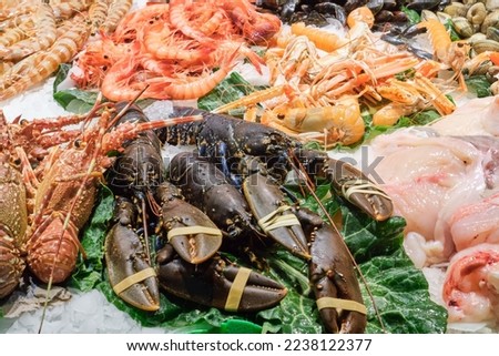 Different kinds of crustaceans for sale at a market in Barcelona