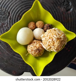 Different Kinds Of Ladoo Like Chewra, Coconut,til Ladoo