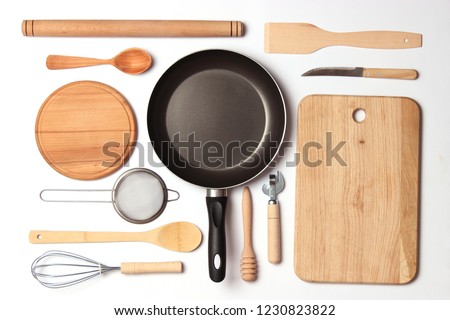 different kitchenware on a light background top view. Cooking appliances. flat lay 