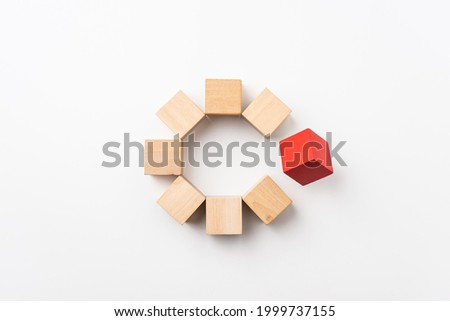 different, leadership, teamwork concept with red wood cube for mock up, isolated on white background