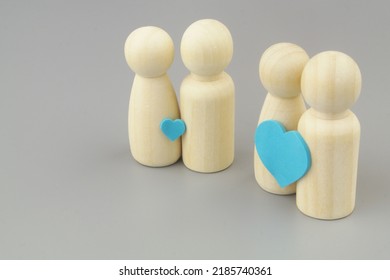 Different Love Between Woman And Man Concept. Two Couples Of People Figures With Big And Small Heart Stickers, Copy Space For Text.