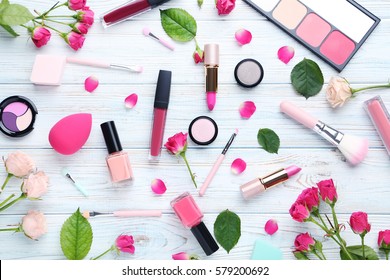 Different makeup cosmetics on white wooden table - Powered by Shutterstock