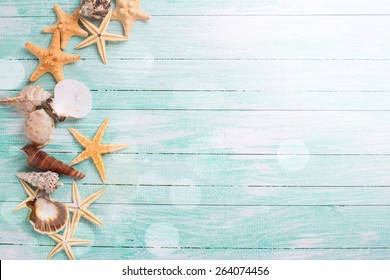 Different Marine Items In Ray Of Light On Turquoise Wooden Background Sea Objects S S Different Marine Items In Ray Of Light On Turquoise Wooden Background Sea Objects S S