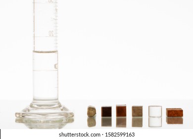 Different materials used to determine density. Including iron, copper, lead, cork, aluminum and plastic. 