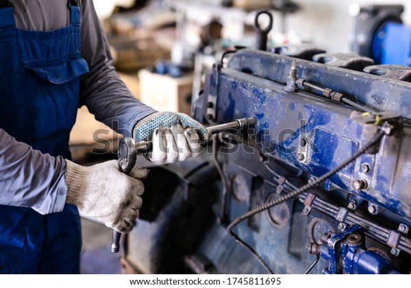 Different\
mechanical tools for auto service and car and truck repair. Old\
motor capital repair. Car service\
concept.