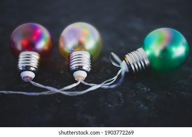 different mindsets and ideas conceptual image, red yellow and green lght bulbs next to each other metaphor of contrasting opinions or attitude