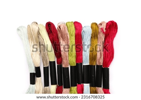 Different mouline threads isolated on white background
