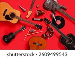 Different musical instruments on red background