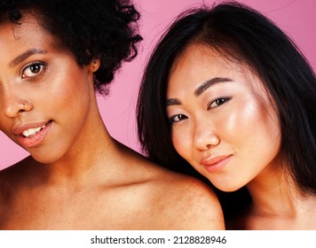 Different Nation Girls With Diversuty In Skin, Hair. Asian, African American Cheerful Emotional Posing On Pink Background, Woman Day Celebration, Lifestyle People Concept