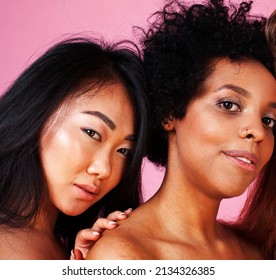 Different Nation Girls With Diversuty In Skin, Hair. Asian, African American Cheerful Emotional Posing On Pink Background, Woman Day Celebration, Lifestyle People Concept