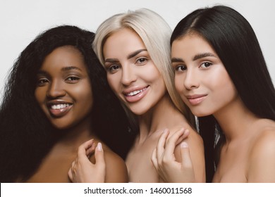 Different nation woman: African-american, Caucasian together isolated on white background happy smiling, diverse type on skin.  Different ethnicity women - on white background.