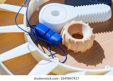 Different objects printed on a 3D printer. Models created on a 3D printer from molten plastic. Modern new additive 3d printing technologies. 3D printing technology