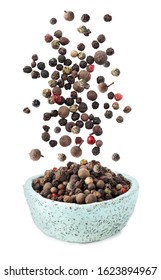 Different Peppercorns Falling Into Bowl On White Background